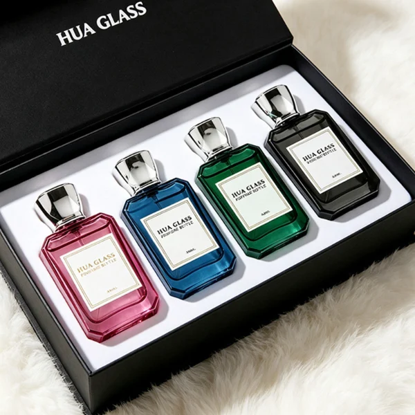 A diamond-cut rectangular glass perfume bottle with a clear, angular profile and an elegant faceted border, paired with a smooth, trapezoidal square plastic cap available in gold, silver, or matte white.
