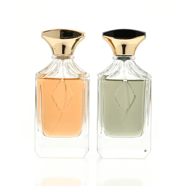 A diamond-cut rectangular clear glass perfume bottle with faceted corners and textured vertical ridges along the upper shoulders, paired with a unique flared, curved plastic cap available in solid gold or black-and-gold finish.
