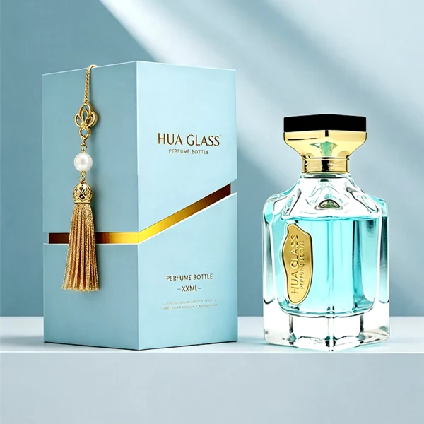 A thick-bottomed rectangular clear glass perfume bottle with faceted upper corners, shown with two cap variations: a crystal-clear faceted crown-shaped cap with a gold core, and a flared gold cap topped with a flat black cube block.