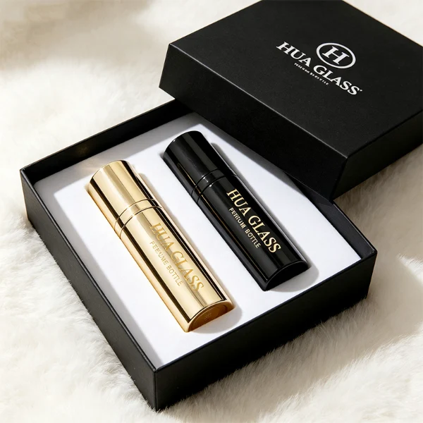 a sleek and ultra-slim 10ml travel-sized cylindrical perfume atomizer bottle features a seamless all-metallic exterior, paired with a matching magnetic cylindrical cap, presented in a high-gloss polished gold finish and a glossy solid black finish.