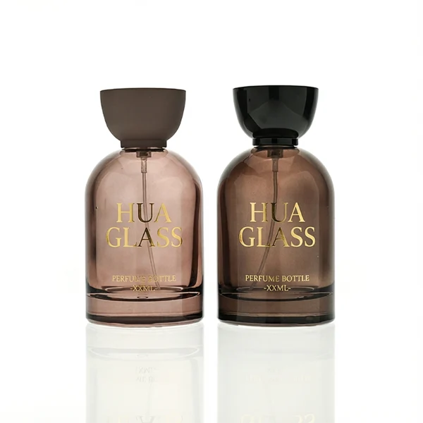HUA0412 perfume bottle, luxury rounded oval glass bottle with translucent deep multi-color finish in brown, grey, red, or blue, featuring a printed gold logo and a unique glossy black tapered cup-shaped wooden or plastic cap, modern elegant fragrance packaging design available in 30ml, 50ml, and 100ml