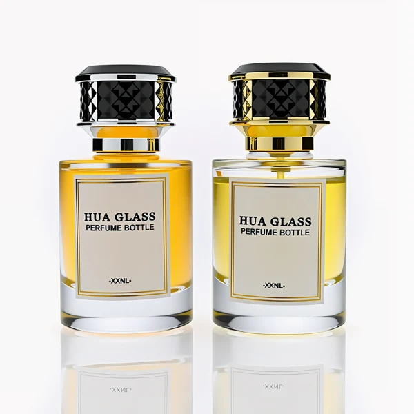 HUA0267 perfume bottle, cylindrical transparent glass body with thick rounded base, 30 ml, 50 ml, or 100 ml liquid, flat cylindrical plastic cap with faceted lattice side texture and gold or silver metallic striped decoration, printed logo label, modern luxury elegance design, ideal for gifting and daily use.