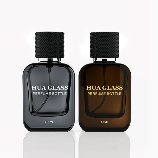HUA0302 perfume bottle, rounded rectangular glass body with thick base in transparent, semi-transparent black, or amber color, 30 ml, 50 ml, or 100 ml liquid, cylindrical plastic cap with gold or silver bottle neck, printed logo or blank bottle surface, modern minimalist luxury design, ideal for gifting and daily use.