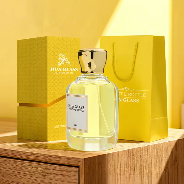 HUA0363 perfume bottle, flat rectangular clear glass body with centered paper label, elegant trophy-shaped plastic cap in gold or silver finish, royal classic luxury fragrance packaging design available in 50ml and 100ml