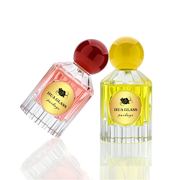 HUA0261 perfume bottle, transparent glass body with radiating cut facets on the upper section and multifaceted cut pattern on the lower section, 50 ml liquid, oversized spherical plastic cap with glossy finish in red or yellow color, gold-tone printed logo label, retro luxury design, ideal for gifting and daily use.